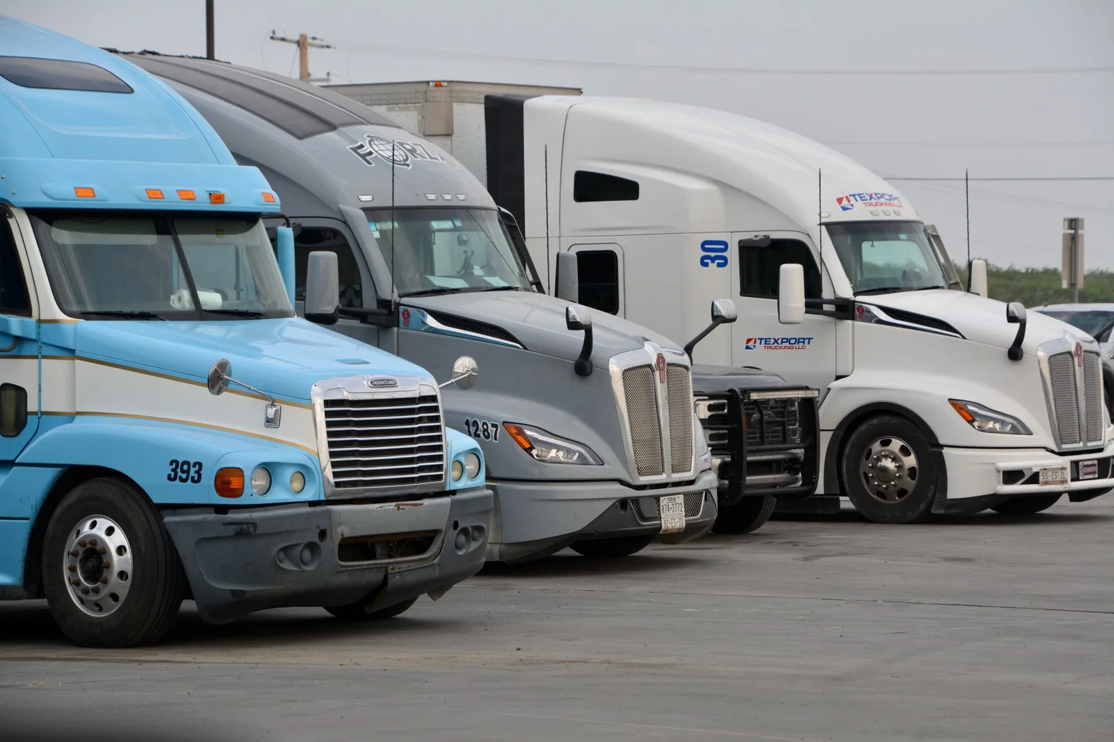 Mechanic repairing a semi-trailer on site